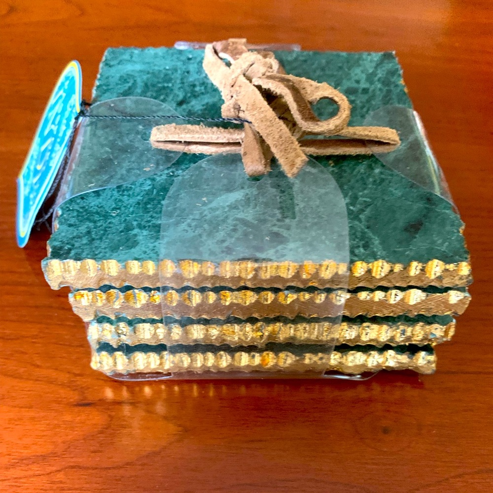 Gorgeous set of 4 green real granite coasters with shiny gold tractor style edge